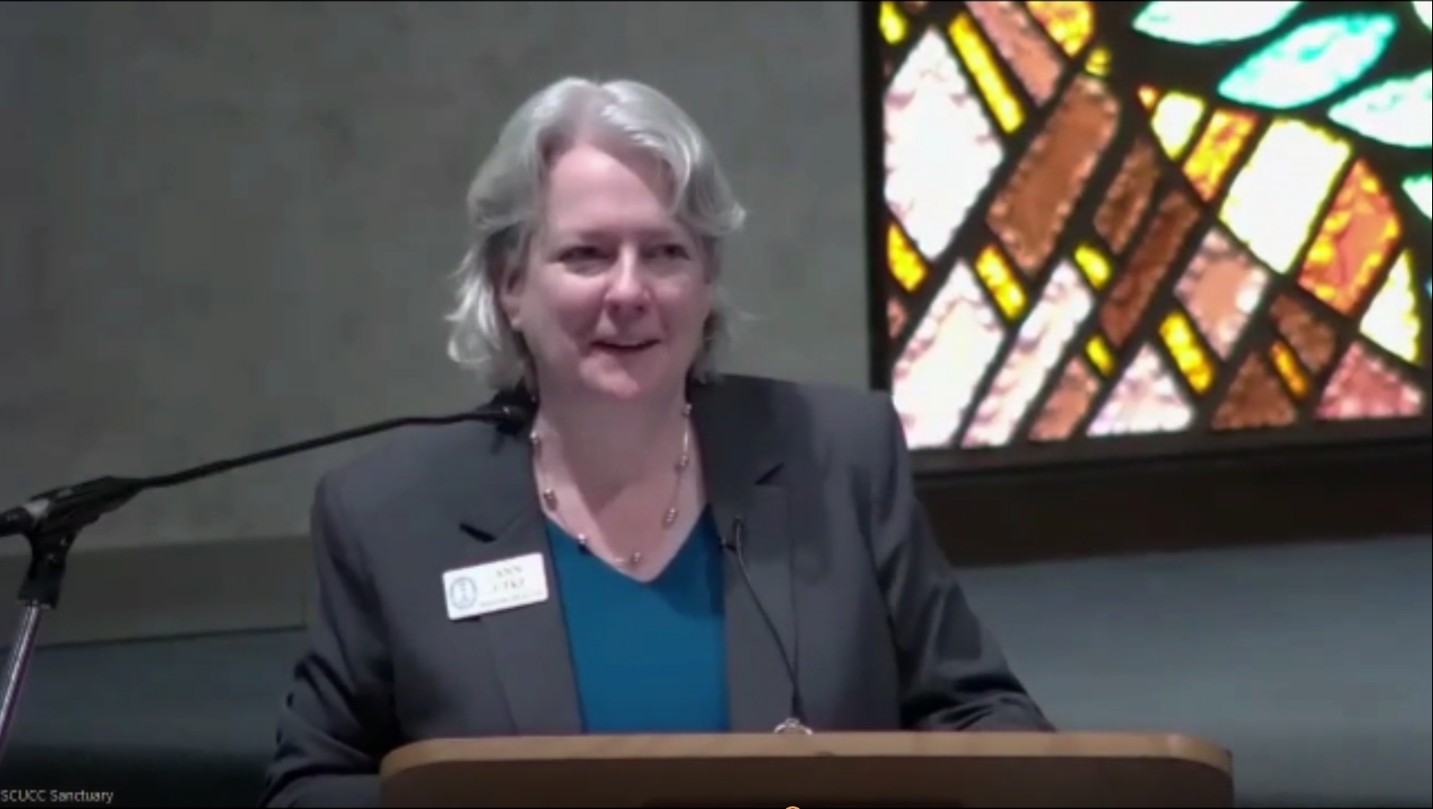Rev Ann Utke at lecturn